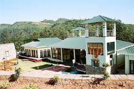 Ananthagiri Haritha Resort buildings on a green hillside on the Araku road
