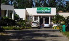 Araku Haritha Valley Resort with lawns and hills of Araku Valley behind