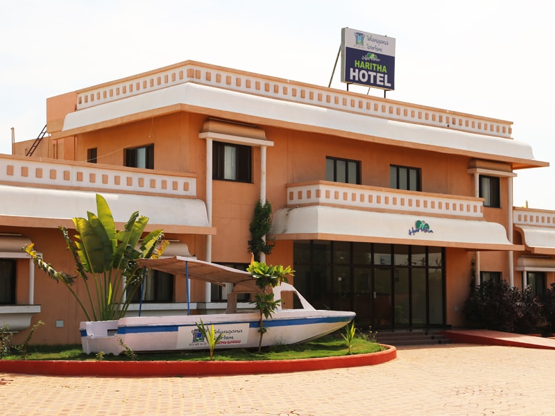 Haritha Hotel Alampur with open parking space in front