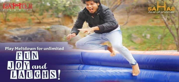 Players jumping over the spinning arm in the Meltdown game at Sahas
