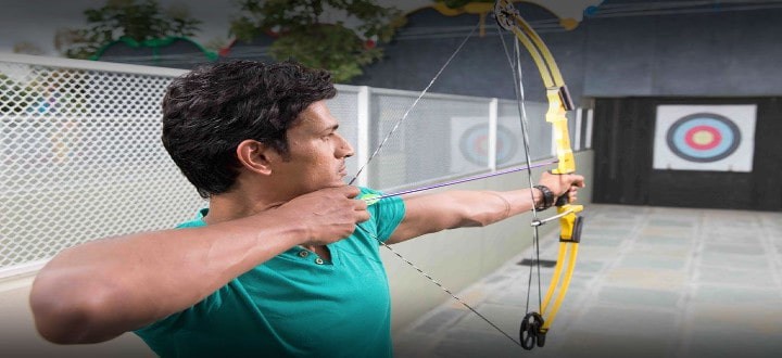 Visitors trying archery and rifle shooting at Sahas Ramoji Film City